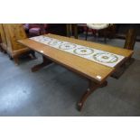 A G-Plan teak and tiled top coffee table