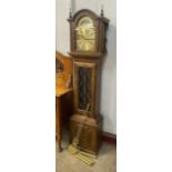 An oak longcase clock