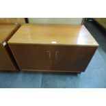 A G-Plan Fresco teak two door cupboard