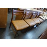 A set of four Jentique teak dining chairs