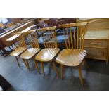 A set of four beech kitchen chairs