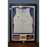 A framed and autographed Adidas running shirt, Jessica Ennis