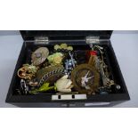 A jewellery box with key and costume jewellery