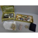 An onyx jewellery box containing wristwatches and a collection of costume jewellery