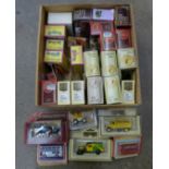 A collection of die-cast vehicles including Matchbox Models of Yesteryear and Days Gone, boxed