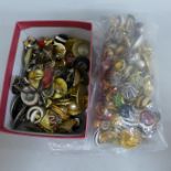 A collection of costume earrings, mostly pairs