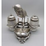 A silver plated cruet in the form of a songbird perched on a branch, kite mark for 1872