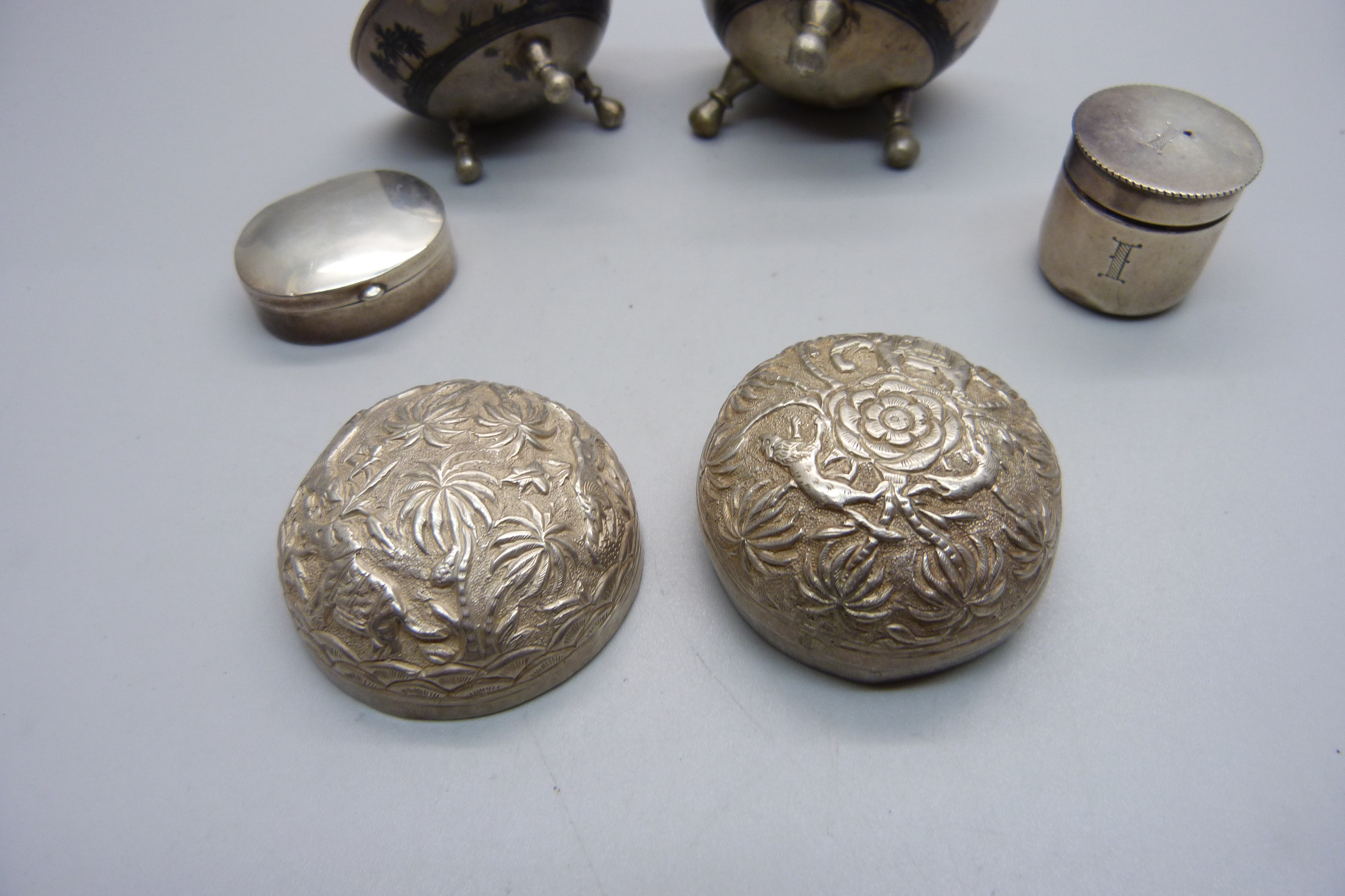 Two silver boxes, one with screw top, two white metal salts with Nile scene decoration and a white - Image 4 of 5
