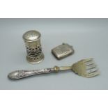 A silver vesta case, a Victorian silver pepper and a fork with silver covered handle