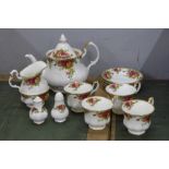 A Royal Albert four setting tea service and a pair of salt and pepper shakers, *PLEASE NOTE THIS LOT