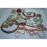 A collection of Eastern white metal jewellery, a coral necklace, etc.
