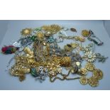 A collection of gold tone vintage costume jewellery