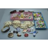 A collection of cloisonne jewellery, acrylic brooches with floral decoration and ceramic brooches