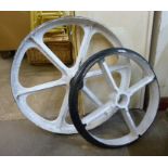 Two cast iron wheels