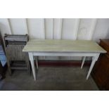 A set of four wooden folding garden chairs and a painted beech kitchen table