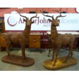 A pair of large cast iron stags