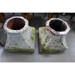 A pair of terracotta chimney pot bases and a set of painted step ladders