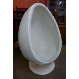 An Eero Aarnio style white laminated egg chair