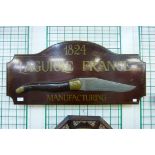 A painted wooden Laguiole France advertising wall plaque