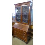 An Edward VII inlaid mahogany bureau bookcase