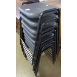 A set of eight black metal framed stools