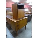 A teak bedside cupboard and a small teak chest of drawers