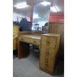 A Waring & Gillows Art Deco oak dressing table
