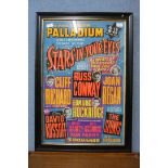 A framed London Palladium poster
