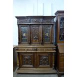 A 19th Century French Henry II style carved oak and side cabinet