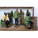 A set of six French painted figures of jazz band musicians, stamped Appanence, Paris