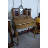 A Victorian inlaid walnut and gilt metal mounted bureau de dame