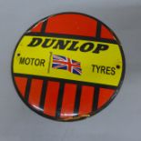 A circular enamel Dunlop sign, 6" (15cm) diameter