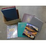 Stamps; a box of year books including Canada 1999 and 2000, Australia 1994 and special cover