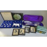 A cased fish serving set, two sets of commemorative spoons, etc.