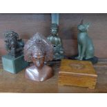 Four figures including Buddha, a wooden box and two bronze models of dogs
