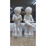 A pair of carved alabaster figures of cherubs, a/f, 29.5cm