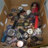 A box of mixed fashion wristwatches