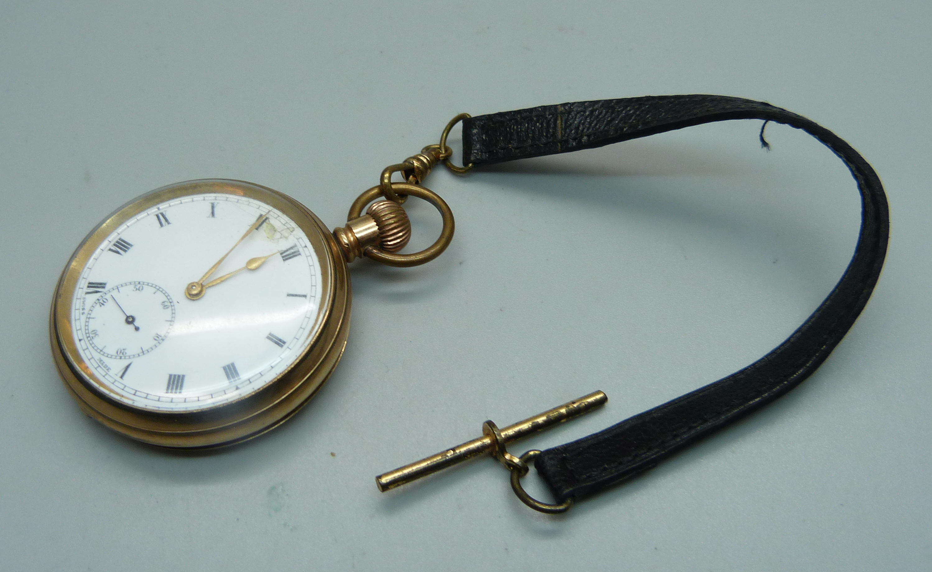 A rolled gold pocket watch, dial a/f