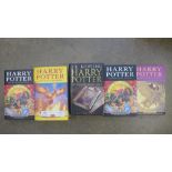 Four Harry Potter first edition books and an early edition of the Prisoner of Azkaban