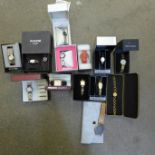 A collection of boxed wristwatches