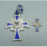 A Third Reich German mother's cross medal and miniature