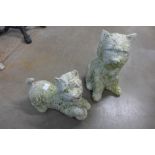 Two concrete Scottie dog garden ornaments