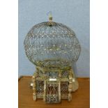 A Victorian style pine and wrought metal bird cage