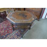 A Victorian Jacobean Revival carved oak octagonal centre table