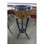 A 19th Century French marquetry inlaid and ebonised jardiniere on stand