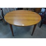 A Danish teak circular dining table