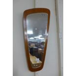 A teak framed mirror