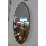 A teak framed mirror