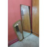 A teak asymmetrical framed mirror and one other