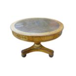 A Regency birds eye maple and leather topped drum shaped library table, manner of George Bullock